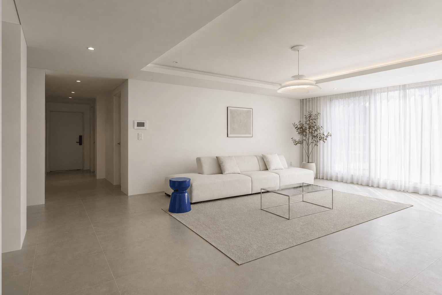 Minimal living room with a vivid cobalt blue stool as a small accent
